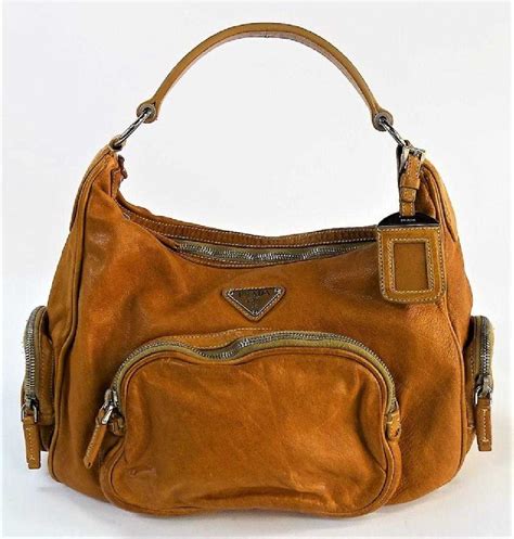 prada tan shoulder bag|Prada outlet shoulder bags.